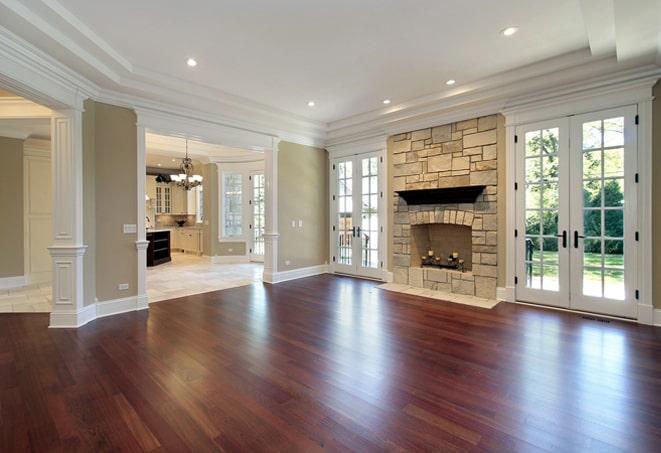 elegant, herringbone patterned hardwood flooring in a formal dining room